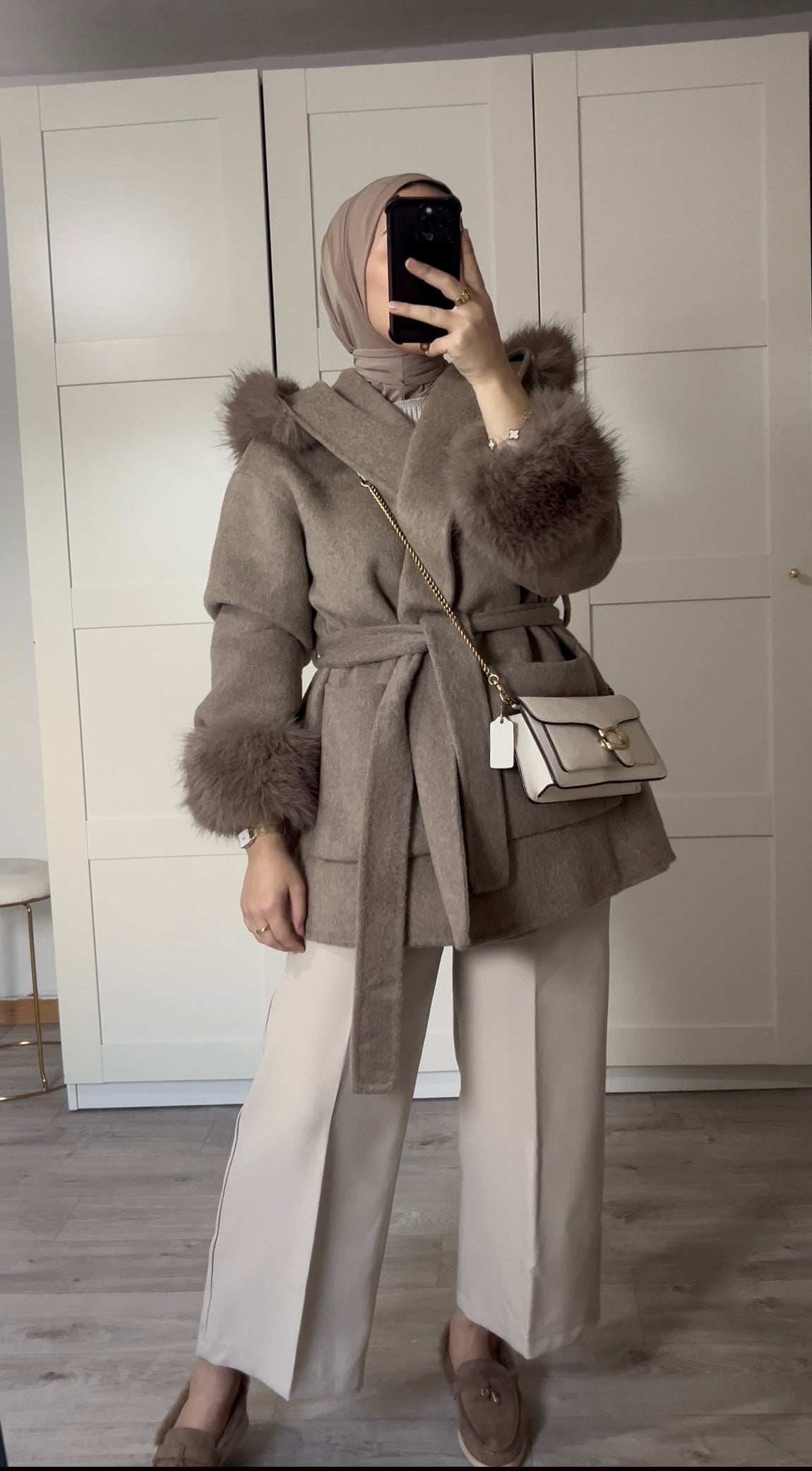 Manteau fourrure ceinturé